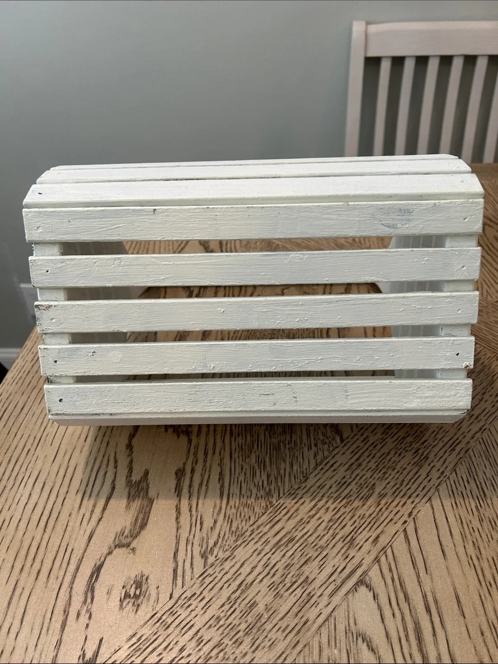 Distressed White Wooden Slatted Tote Basket with Floral Accent